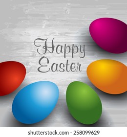 Happy Easter. Easter eggs on the wooden table. wood background. Vector EPS 10 