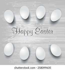 Happy Easter. Easter eggs on the wooden table. Wood background. Vector EPS 10