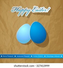 Happy Easter eggs scrapbook postcard white blue. International wishes languages. Crumpled paper brown background.