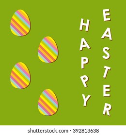 Happy Easter with four colorful eggs on green background