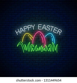 Happy easter glowing signboard with colored eggs on grass in neon style on dark brick wall background. Easter funny greeting banner. Vector illustration.