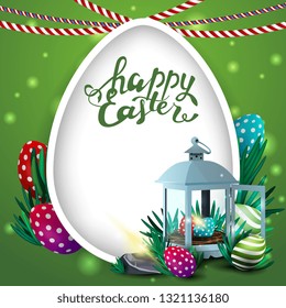 Happy Easter, green postcard with big egg and antique lantern with Easter eggs