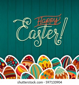 Happy Easter Greeting Card. Dark Green Wooden Background Hand Lettering.  Congratulations Happy Holiday. Easter Egg Hunt.