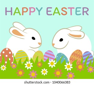 Happy Easter greeting card with easter eggs and green grass
