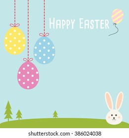 Happy Easter greeting card with easter eggs on blue sky lawn and landscape.