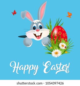Happy Easter greeting card with green grass, flowers, Easter eggs and hiding bunny.Vector illustration