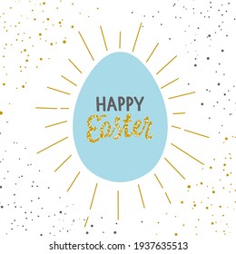 Feliz tarjeta de felicitación de Pascua con letras, en un huevo. Huevo de ave con chispas de oro. 
