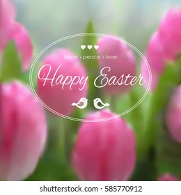 Happy easter greeting card on the blurred background with tulips. Congratulations on the holiday.