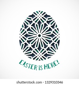 Happy Easter greeting card. Ornamental egg in paper art style on white background. Inscription - Easter is here. Vector illustration