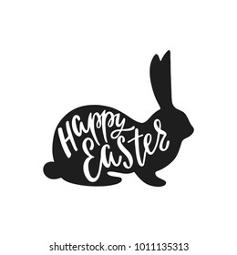 Happy Easter greeting card with silhouette of bunny. Handwritten vector lettering text. Calligraphic phrase. Holiday design.