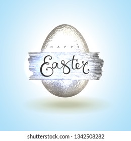 Happy Easter greeting card with silver glitter easter egg, argent glittering brush and text lettering. Realistic vector egg isolated on light blue background