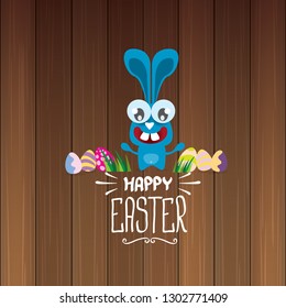 happy easter greeting card. Vector easter color eggs, funny bunny and hand drawn calligraphic text isolated on wooden background. vector spring easter cartoon illustration 