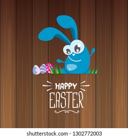 happy easter greeting card. Vector easter color eggs, funny bunny and hand drawn calligraphic text isolated on wooden background. vector spring easter cartoon illustration 