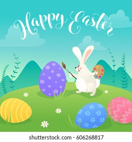 Happy Easter greeting card with white cute bunnies drawing on colorful eggs. Fun illustration of rabbits and eggs on grass and Happy Easter text.