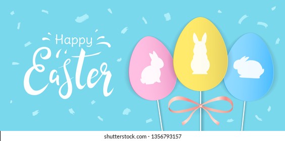 Happy Easter greeting horizontal banner with decorative yellow, blue and pink paper eggs and white bunny silhouettes on blue background. - Vector