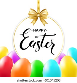 Happy Easter handwritten calligraphy lettering in frame with gold  bow, colorful eggs. Vector illustration.