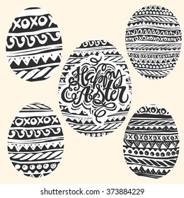 Happy Easter inspirational quote handwritten with black ink and brush, custom lettering for posters, t-shirts and cards. Vector calligraphy on pink watercolor strokes background.