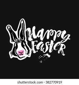 Happy Easter inspirational quote handwritten with black ink and brush, custom lettering for posters, t-shirts and cards. Vector calligraphy on pink watercolor strokes background.