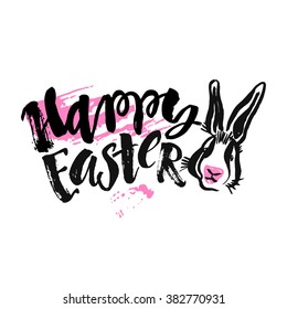 Happy Easter inspirational quote handwritten with black ink and brush, custom lettering for posters, t-shirts and cards. Vector calligraphy on pink watercolor strokes background.