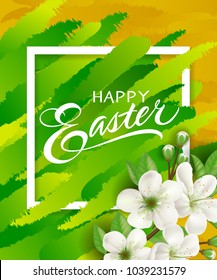 Happy Easter lettering in frame with blooming twig and green strokes on brown background. Calligraphic inscription can be used for greeting cards, festive design, postcards, posters.