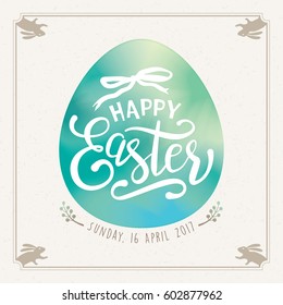 Happy Easter lettering on green watercolor egg