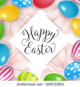 Happy Easter lettering on square. Easter greeting card with flowers and eggs. Handwritten text, calligraphy. For greeting cards, posters, leaflets and brochures.