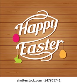 Felices letras de Pascua. Texto de letras blancas sobre fondo de madera marrón