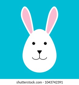 Happy easter. Easter rabbit on a blue background. Rabbit in the form of an egg