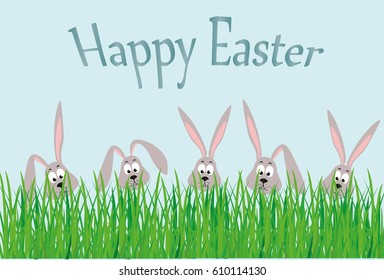 Happy Easter. Rabbits with ears hid behind the grass. Greeting card for the holiday. Free space for text.