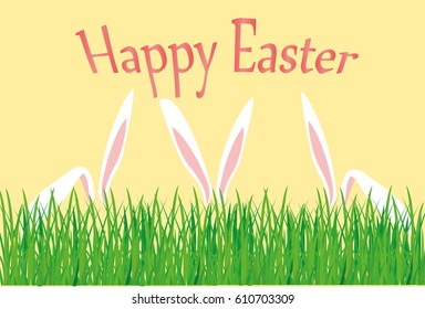Happy Easter. Rabbits with ears hid behind the grass. Greeting card for the holiday. Free space for text.