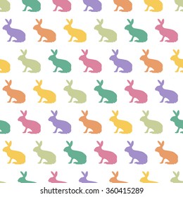 Happy Easter seamless background with silhouettes of rabbits