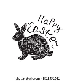 Happy Easter. Silhouette of rabbit with floral patterns and the inscription of a happy Easter. Design of the greeting card. 