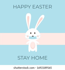 happy easter. stay home. coronavirus bunny with medical mask. covid-19 bunny. CORONAVIRUS EASTER RABBIT. Easter bunny isolated on blue background.