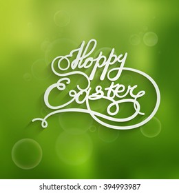 Happy Easter text on green blur background