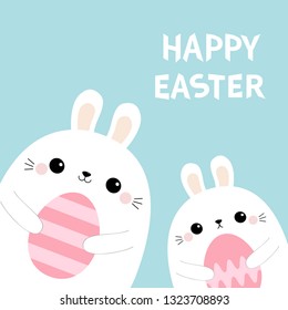 Happy Easter. Two rabbit bunny friends holding painting egg set. Cute cartoon kawaii funny baby character. Farm animal. Blue pastel background. Flat design Vector illustration