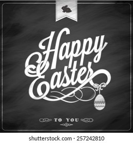 Happy Easter Typographical Background On Blackboard With Chalk