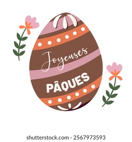 Happy Easter written in French "Joyeuses Pâques". Chocolate egg