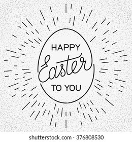Happy Easter To You handwritten lettering and light rays on the vintage background.