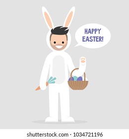 Happy easter. Young male character wearing a white bunny costume and holding a basket with dyed eggs. Holidays. Flat editable vector illustration, clip art. Culture and celebrations.