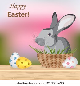 Happy Easter.Colorful,different patterned eggs and cute rabbit sitting in the basket with green grass.Template vector greeting card with realistic eggs on the table.Spring holiday illustration