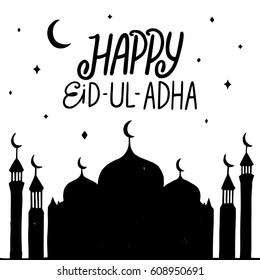 Happy eid ul adha handwritten lettering. Vector calligraphy with mosque isolated on white background for your design. Typographical design