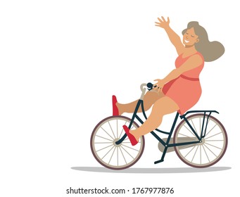 feliz anciana con pelo gris monta en bicicleta. ocio activo de los pensionistas. la vejez feliz. mujer monta una bicicleta divertida y mueve una mano