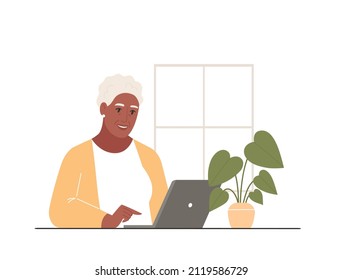 Feliz anciana está trabajando en una laptop en casa. Concepto de tecnología y gente mayor. Ilustración vectorial plana