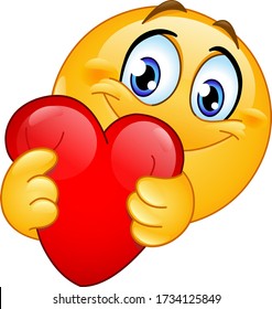 Happy emoji emoticon hugging a red heart