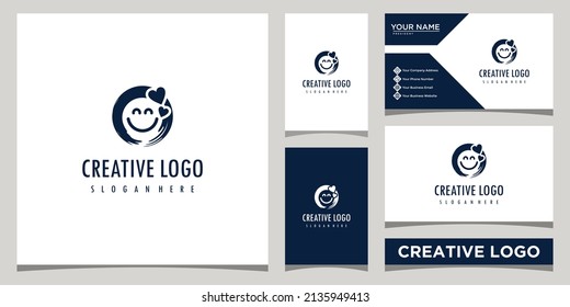Happy emoticon logo design template in brushstroke style with business card design Premium Vector