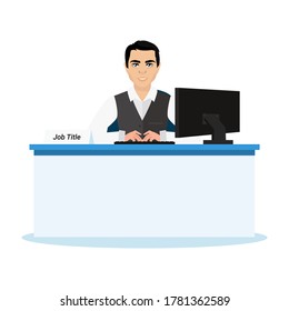 A happy employee is sitting in front of the computer at his desk