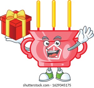 Happy face chinese red incense cartoon character having a box of gift