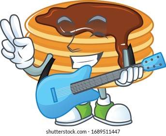 Happy face of chocolate cream pancake cartoon plays music with a guitar