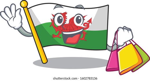 Happy face flag wales Scroll mascot style waving and holding Shopping bag