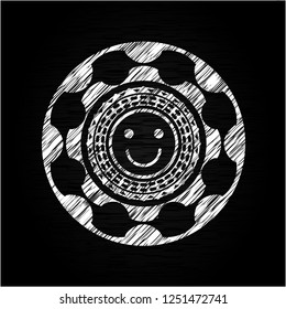 happy face icon with chalkboard texture